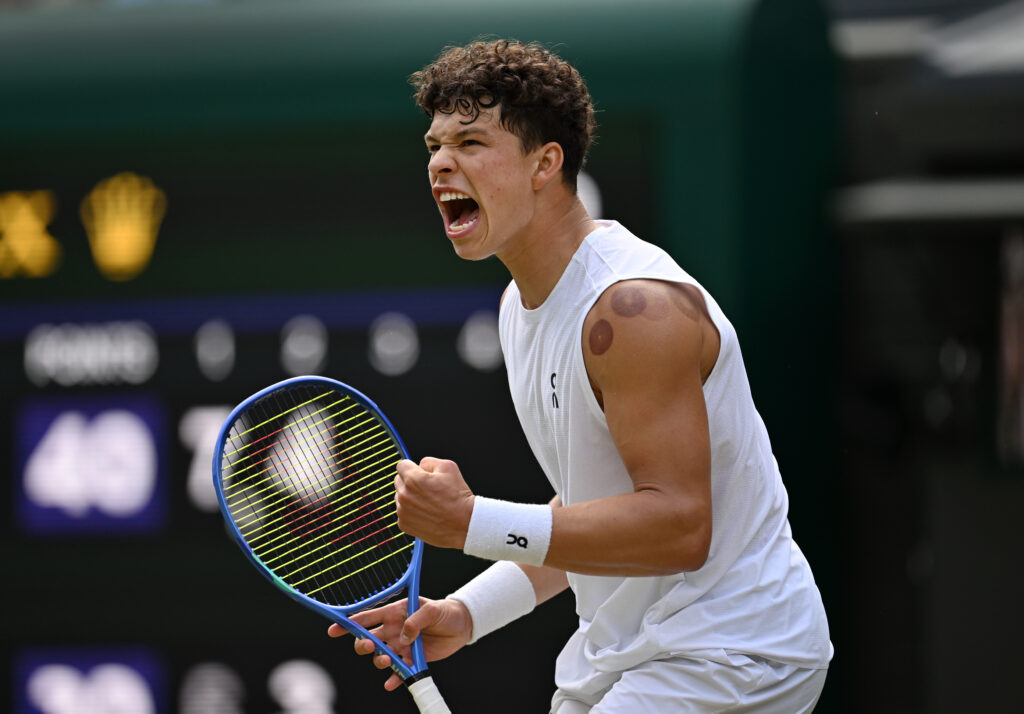 Ben Shelton of United States celebrates winning a point against Jannik Sinner of Italy during the Gentlemen's Singles quarter-final match on day ten of The Championships Wimbledon 2025 at All England Lawn Tennis and Croquet Club on July 09, 2025 in London, England.