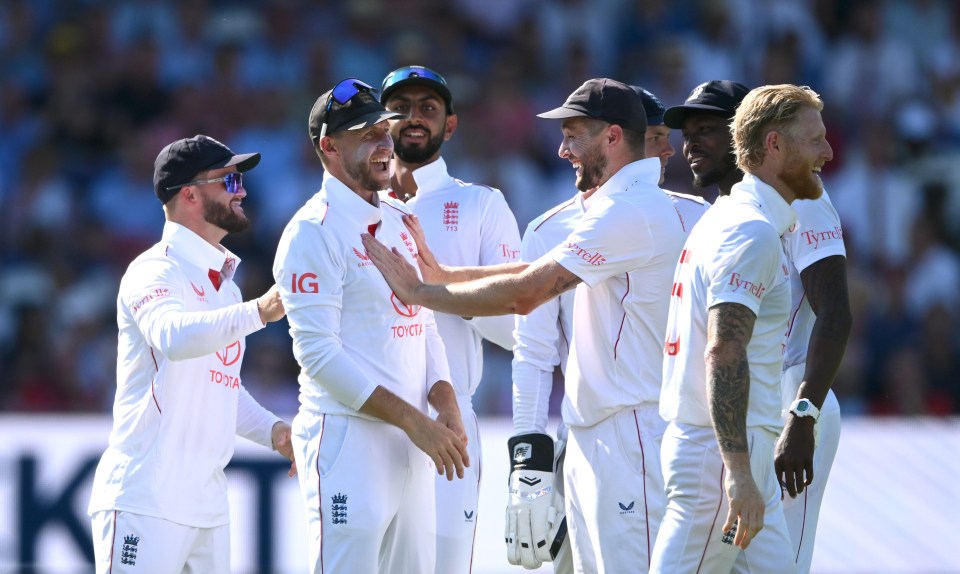LONDON, ENGLAND - JULY 11: England fielder Joe Root is congratulated by team mates after taking his 211th Test Match catch, that of india batsman Karun Nair during day two of the Third Test Match between England and India at Lord's Cricket Ground on July 11, 2025 in London, England. (Photo by Stu Forster/Getty Images)