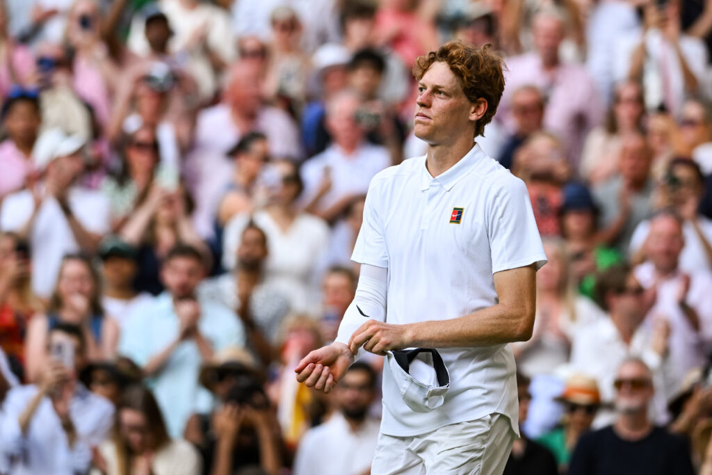 Jannik Sinner of Italy celebrates winning match point against Carlos Alcaraz of Spain during the Men's Singles Final on day fourteen of The Championships Wimbledon 2025 at All England Lawn Tennis and Croquet Club on July 13, 2025 in London, England.