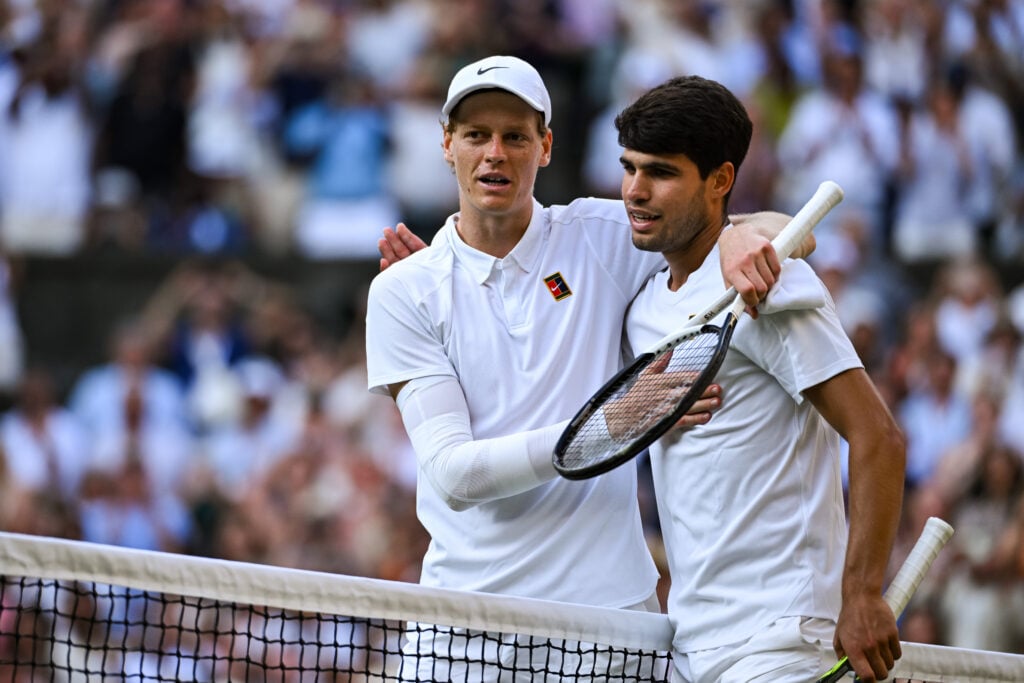 Jannik Sinner of Italy and Carlos Alcaraz of Spain after the Men's Singles Final on day fourteen of The Championships Wimbledon 2025 at All England Lawn Tennis and Croquet Club.