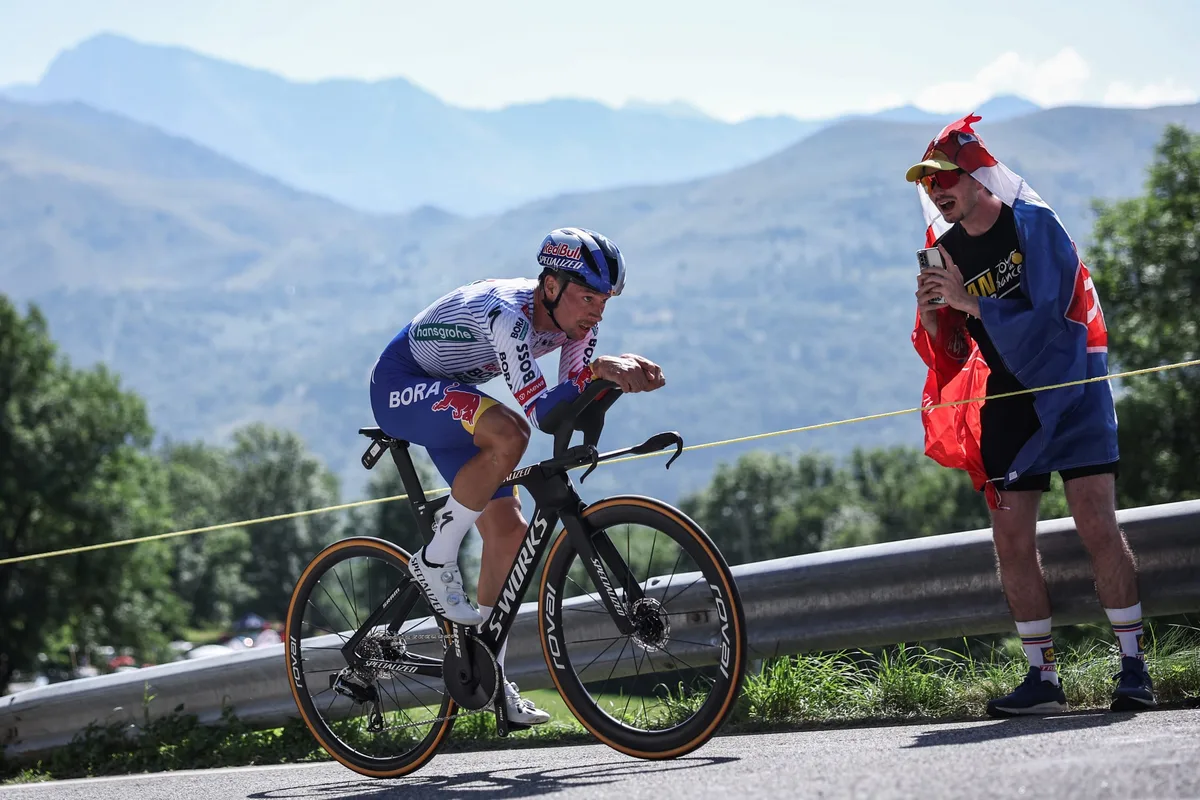 Red Bull - BORA - hansgrohe team's Slovenian rider Primoz Roglic cycles during the 13th stage of the 112th edition of the Tour de France cycling race, 10.9 km individual time trial between Loudenvielle and Peyragudes, in the Pyrenees mountains of southwestern France, on July 18, 2025. (Photo by Anne-Christine POUJOULAT / AFP) (Photo by ANNE-CHRISTINE POUJOULAT/AFP via Getty Images)