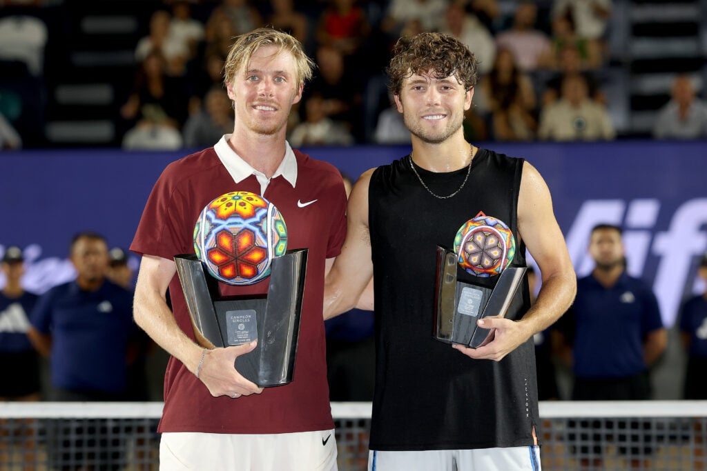 Denis Shapovalov of Canada and Aleksandar Kovacevic of United States pose with their trophies after the final of Mifel Tennis Open by Telcel Oppo at the Cabo Sports Complex.