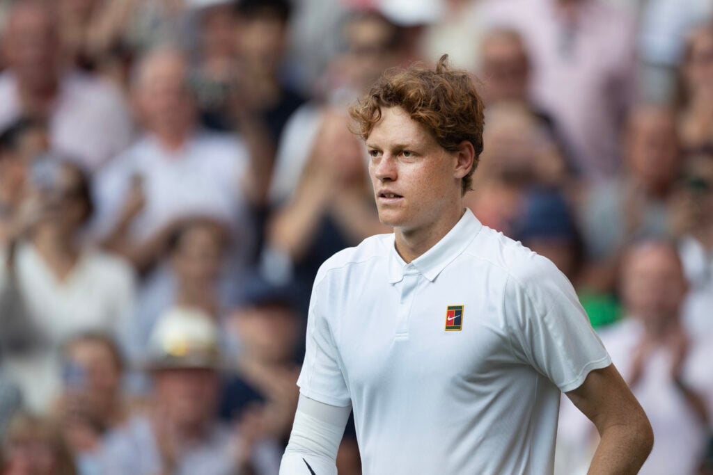 Jannik Sinner looks on after winning the 2025 Wimbledon title