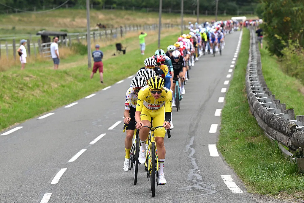 PARIS - CHAMPS-ELYSEES, FRANCE - JULY 27: Tadej Pogacar of Slovenia and UAE Team Emirates - XRG - Yellow leader jersey leads the peloton during the 112th Tour de France 2025, Stage 21 a 132.3km stage from Mantes-la-Ville to Paris - Champs-Elysees / #UCIWT / on July 27, 2025 in Paris - Champs-Elysees, France. (Photo by Dario Belingheri/Getty Images)