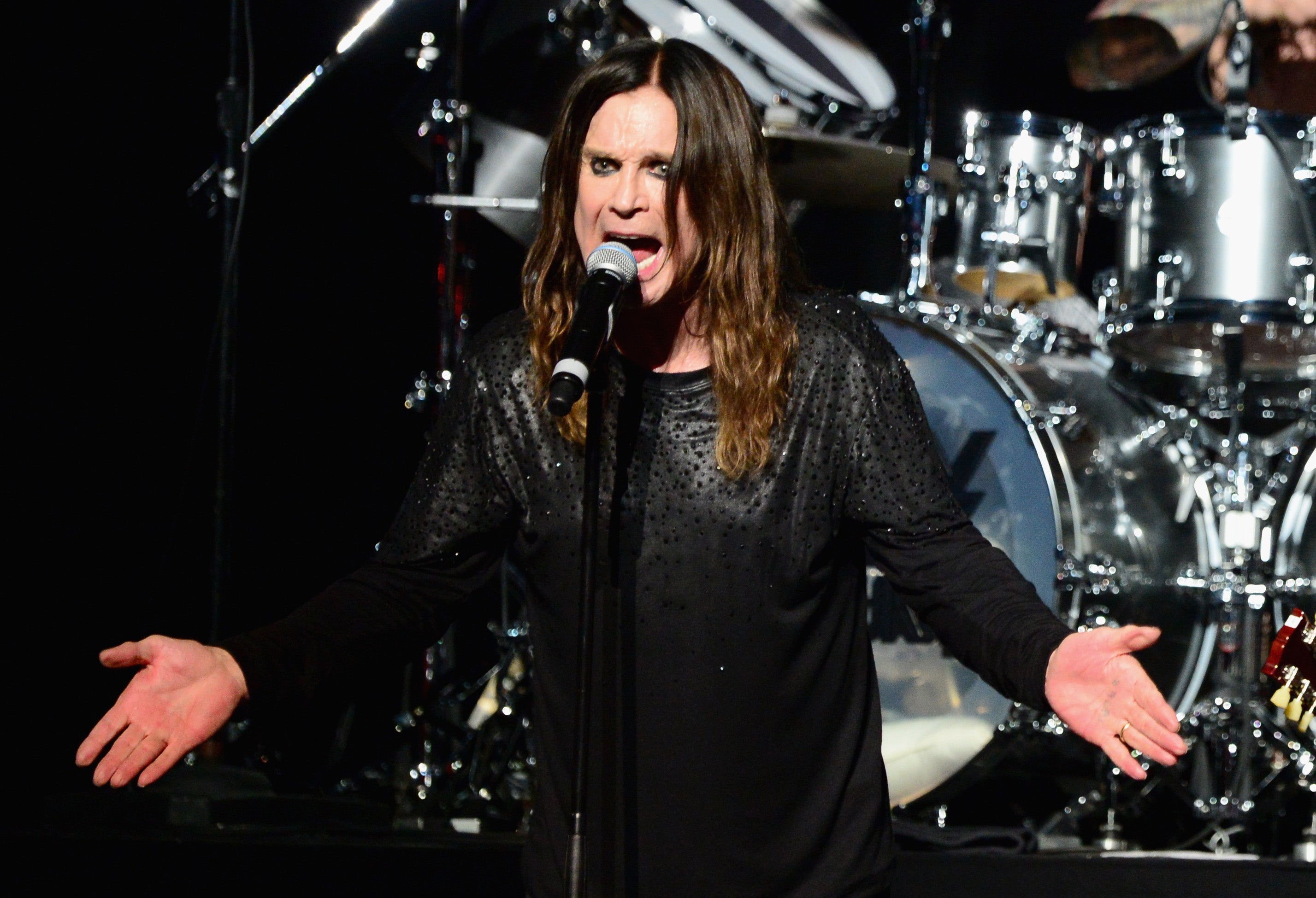 Musician Ozzy Osbourne performs onstage at the 10th annual MusiCares MAP Fund Benefit Concert at Club Nokia on May 12, 2014 in Los Angeles, California.