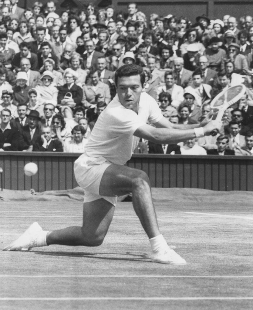 Nicola Pietrangeli in action against Rod Laver in the 1960 Wimbledon semifinals