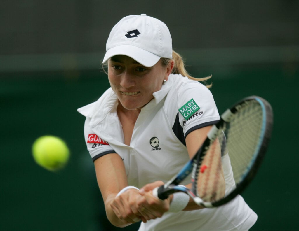 Catalina Castano of Colombia in action during her first round match against Martina Navratilova of USA at the Wimbledon Lawn Tennis Championship.