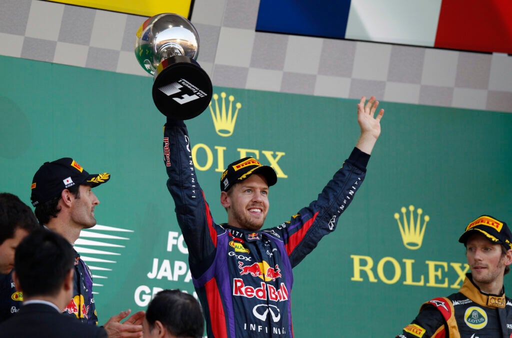 Red Bull driver Sebastian Vettel celebrates winning the 2013 Japanese Grand Prix at Suzuka