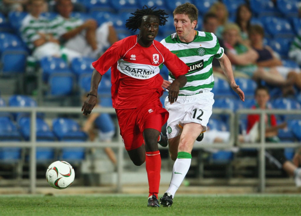 Marvin Emnes of Middlesbrough battles with Mark Wilson of Celtic during the Algarve Challenge Cup match between Celtic and Middlesbrough