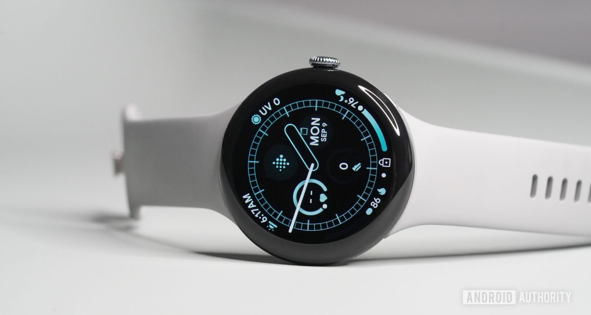 A Google Pixel Watch 3 rests on its side.