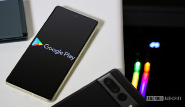 Google Play Store logo on smartphone stock photo.