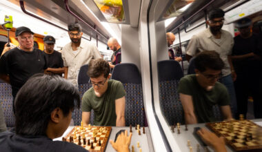 A chess match taking place on the West Midlands Railway train
