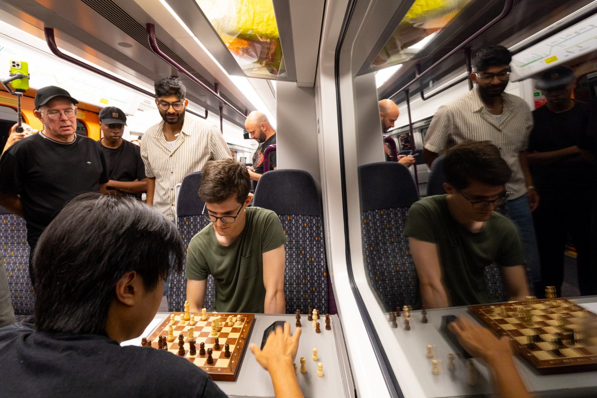 A chess match taking place on the West Midlands Railway train