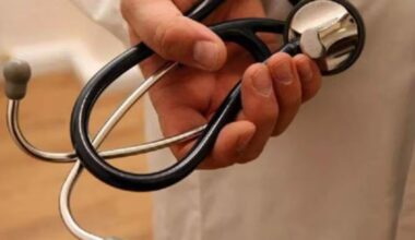 A representational photo of a doctor holding a stethoscope