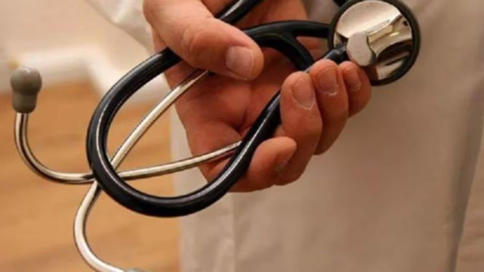 A representational photo of a doctor holding a stethoscope