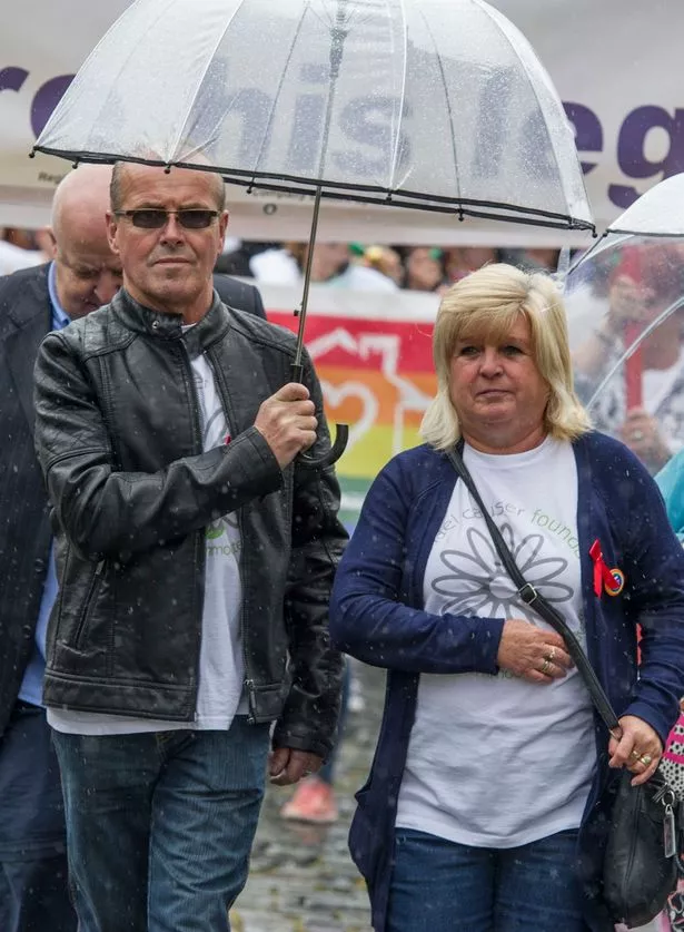 Michael Causer's family, including his parents Marie and Mike, were at the front of the parade, as heavy rain did little to dampen the spirits of the hundreds of people who turned out to celebrate Liverpool Pride. Beginning at St George's Plateau, members of the city's lesbian, gay, bisexual and transgender community marched through the city streets.
Photo by James Maloney