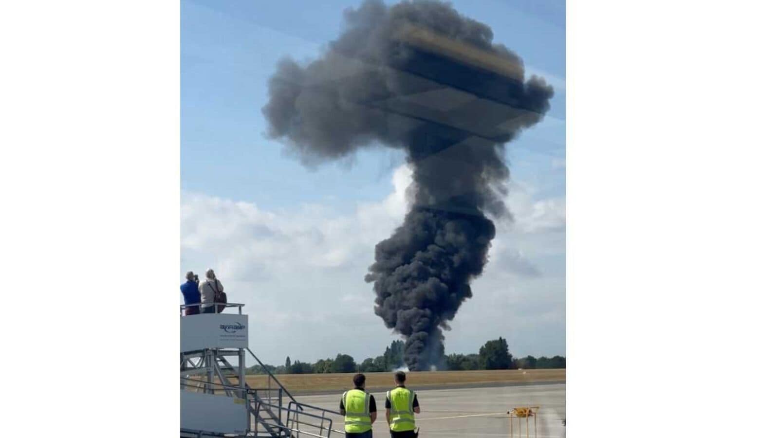 Plane crashes at London Southend Airport: Thick plum of smoke seen near crash site.