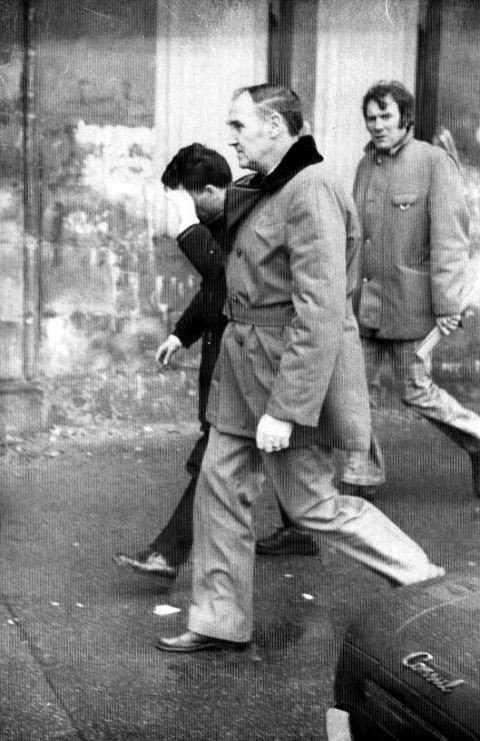 PICTURE SHOWS ALEXANDER MILLAR (HIDING FACE) WHO MURDERED JOHN MCMONIGLE AND IRENE MCMONIGLE IN THEIR HOME IN GOLSPIE STREET, GOVAN, GLASGOW, IN 1976.