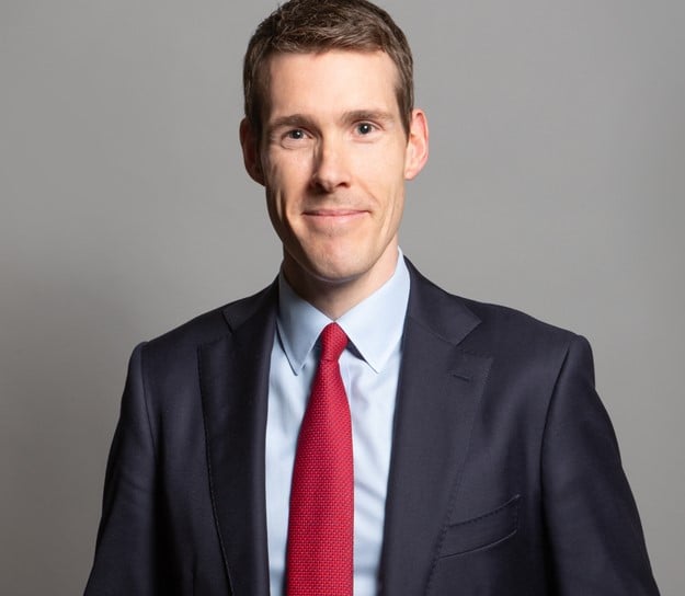 Matthew Pennycook an MP who is responsible for housing in the Labour government wearing a suit.