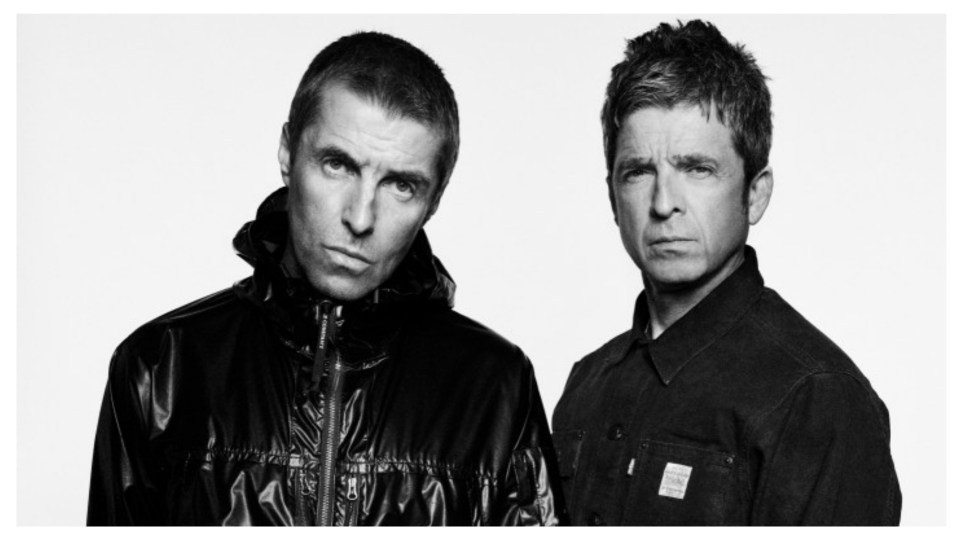 Black and white photo of Noel and Liam Gallagher.