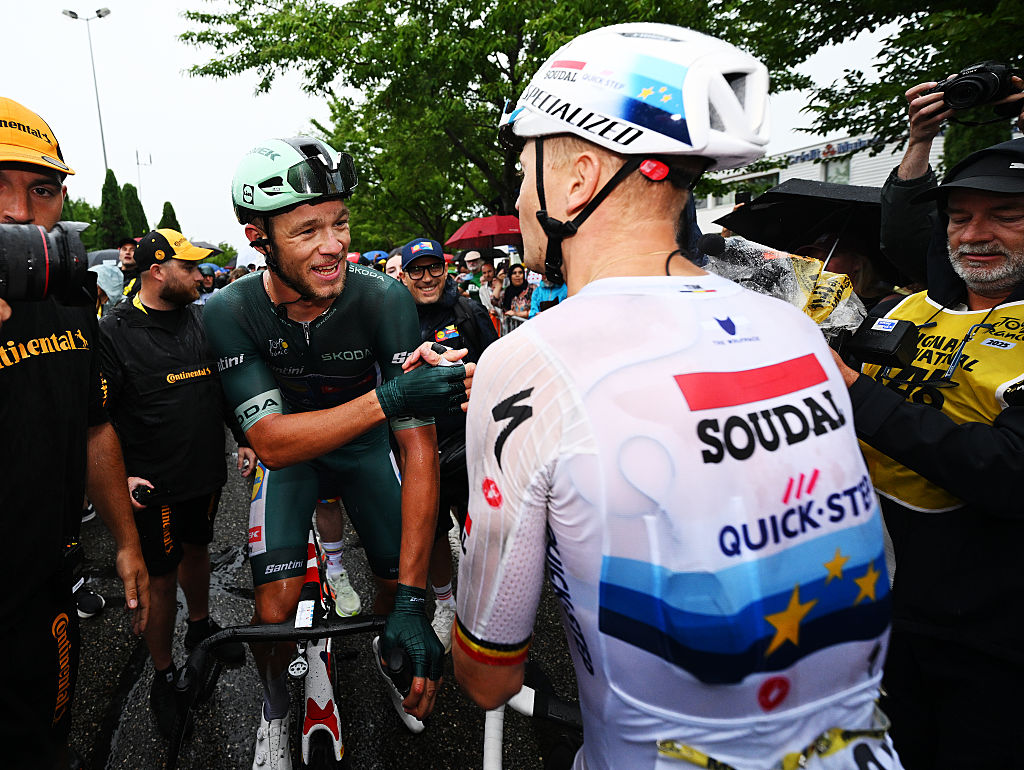 VALENCE, FRANCE - JULY 23: (L-R) The stage winner Jonathan Milan of Italy and Team Lidl - Trek - Green Sprint Jersey and Tim Merlier of Belgium and Team Soudal Quick-Step congratulate each other during the 112th Tour de France 2025, Stage 17 a 160.4km stage from Bollene to Valence / #UCIWT / on July 23, 2025 in Valence, France. (Photo by Dario Belingheri/Getty Images)
