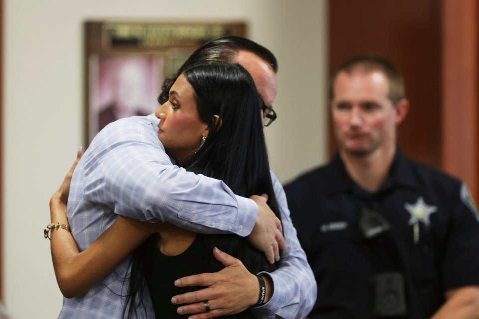 Steve Goncalves hugging his daughter Alinea at the sentencing hearing for Bryan Kohberger.