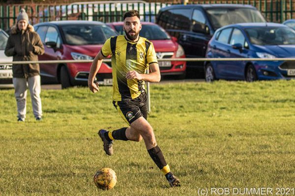 Owain James playing football for Church Village FC