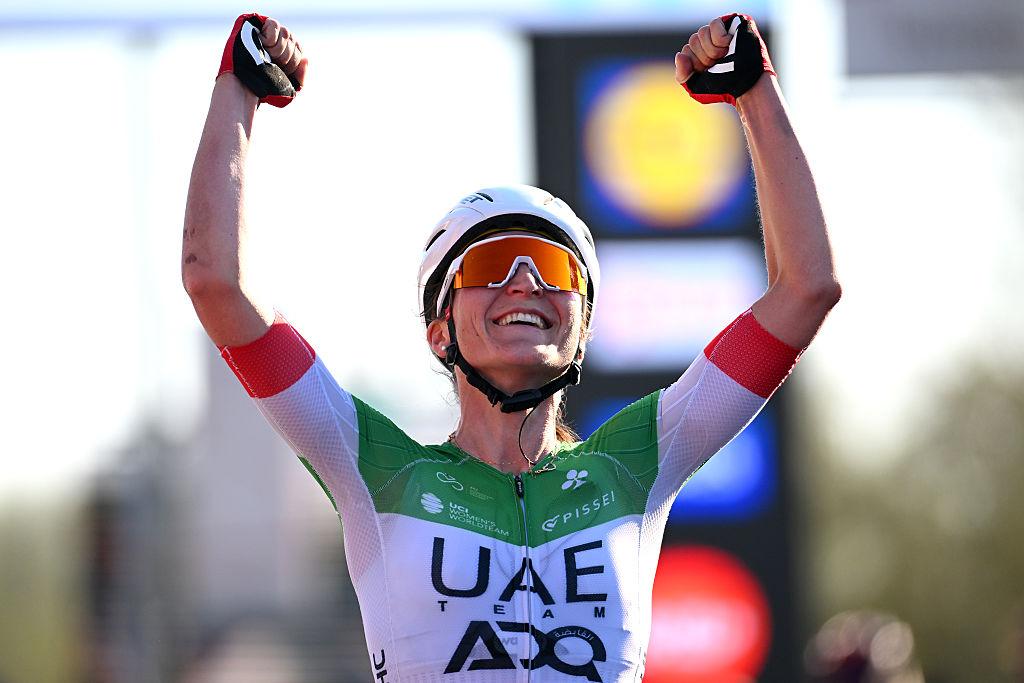WAREGEM, BELGIUM - APRIL 02: Elisa Longo Borghini of Italy and UAE Team ADQ celebrates at finish line as race winner during the 13rd Dwars door Vlaanderen 2025 - Women's Elite a 128.5km one day race from Waregem to Waregem / #UCIWWT / on April 02, 2025 in Waregem, Belgium. (Photo by Tim de Waele/Getty Images)