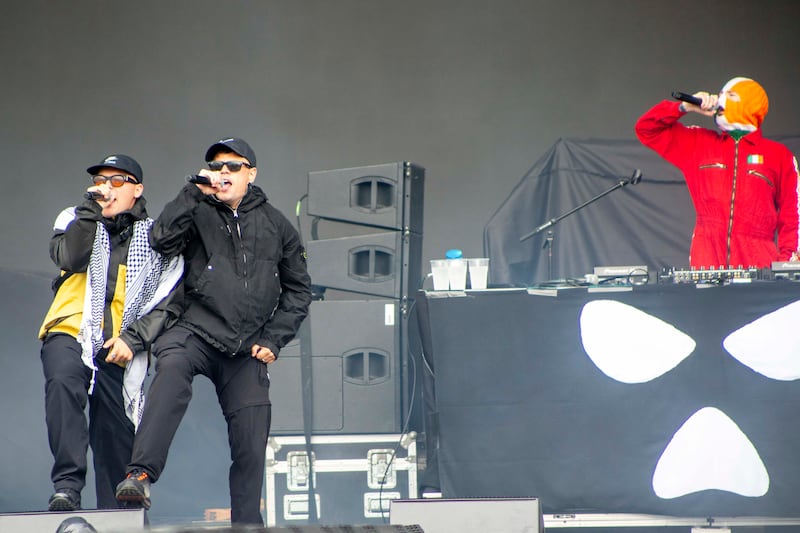 (left to right) Mo Chara, Moglaí Bap and DJ Próvaí from Kneecap performing on stage at London's Finsbury Park. Photograph: Jeff Moore/PA Wire 