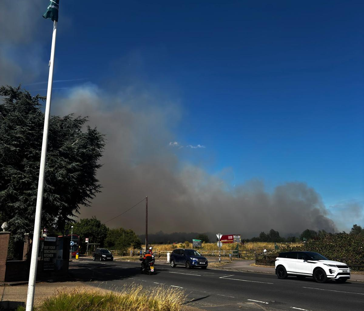 Wildfire spreads across 10 hectares as 80 firefighters battle major blaze in east London