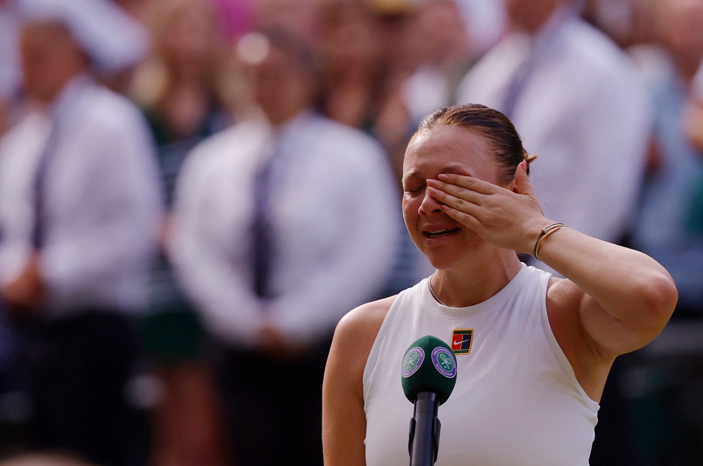 Runner up Amanda Anisimova gives a speech after losing the women's singles final