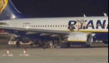 At least 18 injured as UK-bound Ryanair passengers leap onto wing after fire alert in Majorca