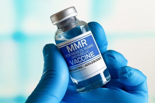 Vaccination for booster shot for MMR Measless, Mumps and Rubella diseases in the children and adolescents. Doctor with vial of the doses vaccine for MMR Measless, Mumps and Rubella diseases; Shutterstock ID 2137265321; purchase_order: -; job: -; client: -; other: - 11779741 12516371
