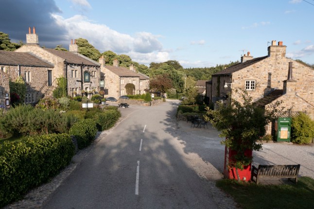 Editorial use only Mandatory Credit: Photo by ITV/REX/Shutterstock (13429047q) Emmerdale Village, featuring the Woolpack pub 'Emmerdale' TV Show, Episodes 9482-9501 UK - Oct 2022 Emmerdale, is a British ITV long running soap opera, known as Emmerdale Farm until 1989, set in Emmerdale, a fictional village in the Yorkshire Dales. It was created by Kevin Laffan and was first broadcast on 16 October 1972. It was originally produced by ITV Yorkshire and is still filmed in their Leeds studios.