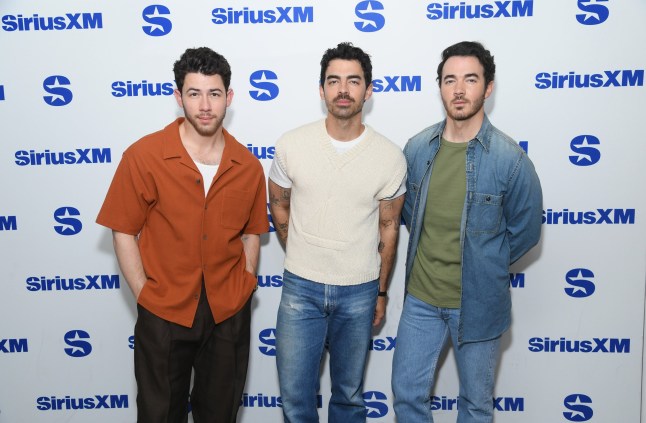 NEW YORK, NEW YORK - JUNE 18: (L-R) Nick Jonas, Joe Jonas and Kevin Jonas of the band Jonas Brothers visit SiriusXM Studios on June 18, 2025 in New York City. (Photo by Gary Gershoff/Getty Images)