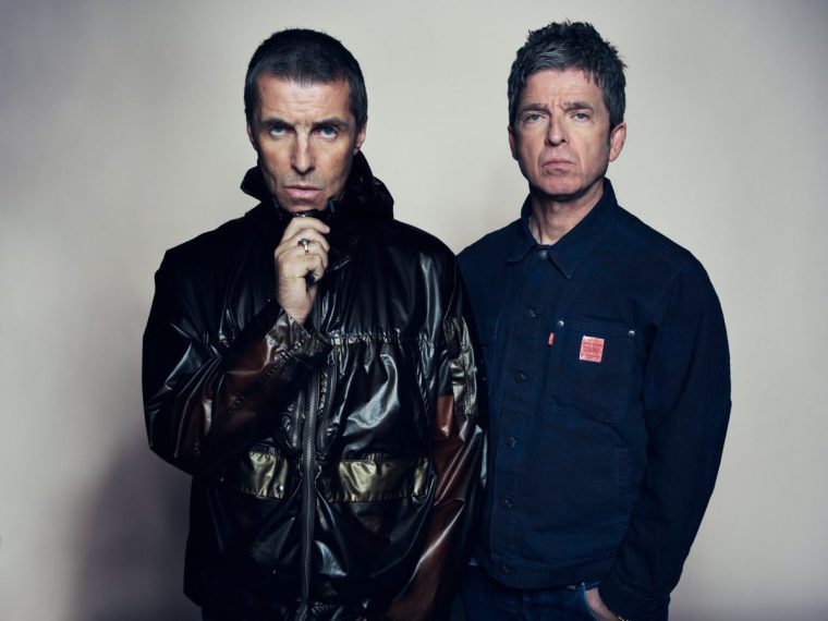 Liam and Noel last year when their reunion tour was announced (Photo: Live Nation)