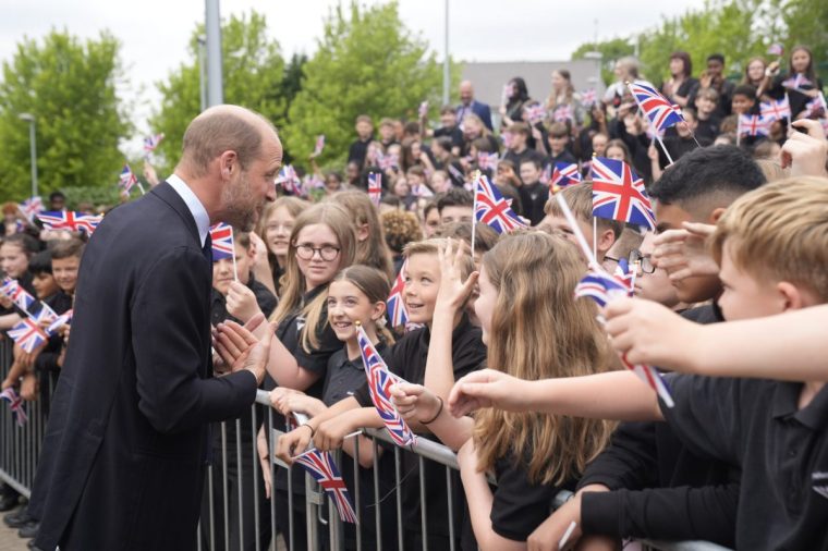 SHEFFIELD, ENGLAND - JULY 1: Prince William, Prince of Wales meets pupils during a visit to Meadowhead Secondary School in Sheffield, as part of his visit to the city to mark the two-year anniversary of the Homewards Programme on July 01, 2025 in Sheffield, England. For the past two years, Royal Foundation's Homewards programme has set out to demonstrate ways to end homelessness. (Photo by Danny Lawson-WPA Pool/Getty Images)