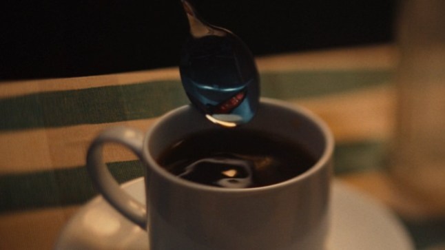 Mephisto's demonic face reflected in the back of a spoon.