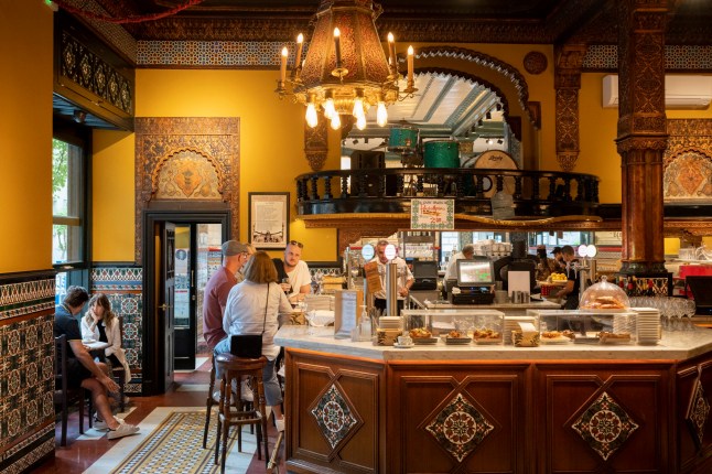 An interior of Cafe Iruna, on 20th May 2022, in Bilbao, Cantabria, Spain. Cafe Iruna is located in front of Albia Gardens in central Bilbao and was inaugurated on July 7th 1903 by the great developer, D. Severo Unzue Donamaria. Its decor is Mudejar-inspired with polychrome ceilings and an abundant collection of painted murals, all recently restored. (Photo by Richard Baker / In Pictures via Getty Images)