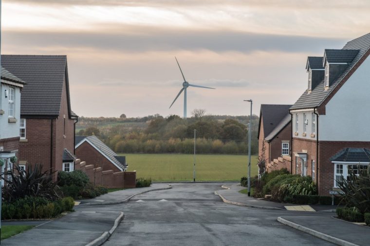 Ravenstone, Leicestershire, England, November 19th 2022. Modern housing estate with wind turbine in the background.