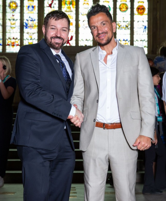 Fabio D'Andrea & Peter Andre shaking hands in parliament