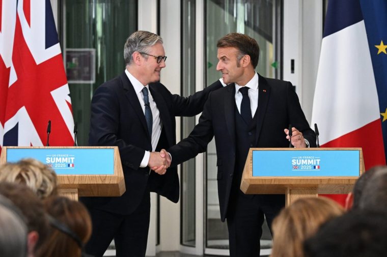 LONDON, ENGLAND - JULY 10: British Prime Minister Keir Starmer (L) and French President Emmanuel Macron shake hands as they hold a press conference on July 10, 2025 in London, England. President Emmanuel Macron and Mrs Brigitte Macron visit the UK in the first visit State Visit made by France in 17 years. They are staying at Windsor Castle, hosted by King Charles III and Queen Camilla, and a banquet will be held there in their honour. The Macrons will visit Imperial College, and the President will address Parliament during his stay. (Photo by Leon Neal/Getty Images)