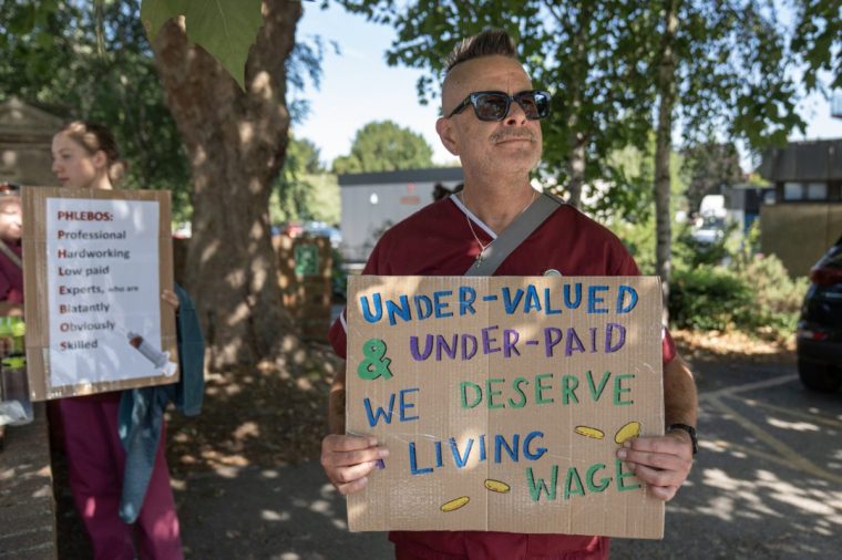 Kelvin Willsher among Phlebotomists on Strike at Cheltenham General Hosptial in Gloucestershire in a dispute with Gloucestershire Hospital Foundation Trust. 10/7/25. Photo Tom Pilston