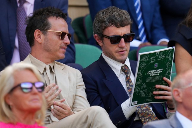 Actors Paul Mescal and Andrew Scott sit in the Royal Box to watch Veronika Kudermetova of Russia and Elise Mertens of Belgium against Jelena Ostapenko of Latvia and Su-Weih Hsieh of Taiwan during the women's doubles final match at the Wimbledon Tennis Championships in London, Sunday, July 13, 2025.(AP Photo/Kirsty Wigglesworth)