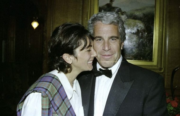 (FILES) This undated trial evidence image obtained December 8, 2021, from the US District Court for the Southern District of New York shows British socialite Ghislaine Maxwell and US financier Jeffrey Epstein. US President Donald Trump blasted his own supporters and "stupid" Republicans on July 16, 2025, as he went on the attack against anyone questioning his administration's handling of the case of dead sex criminal Jeffrey Epstein. Trump is facing the most serious split in his loyal right-wing base since he returned to power, over claims that his administration is covering up lurid details of disgraced financier Epstein's crimes to protect rich and powerful figures. Epstein died by suicide in a New York prison in 2019 -- during Trump's first term -- after being charged with sex trafficking in a scheme where he allegedly groomed young and underage women for sexual abuse by the rich and powerful. (Photo by Handout / US District Court for the Southern District of New York / AFP) / RESTRICTED TO EDITORIAL USE - MANDATORY CREDIT "AFP PHOTO / US District Court for the Southern District of New York" - NO MARKETING - NO ADVERTISING CAMPAIGNS - DISTRIBUTED AS A SERVICE TO CLIENTS (Photo by HANDOUT/US District Court for the Southern District of New York/AFP via Getty Images)