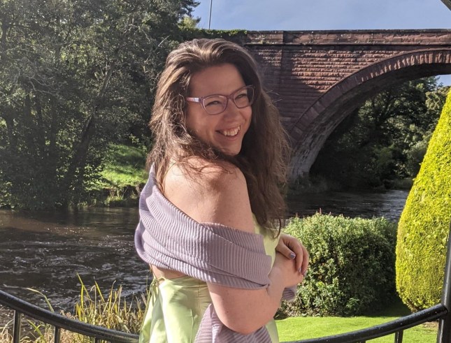 Hannah Shewan Stevens smiles in formal dress