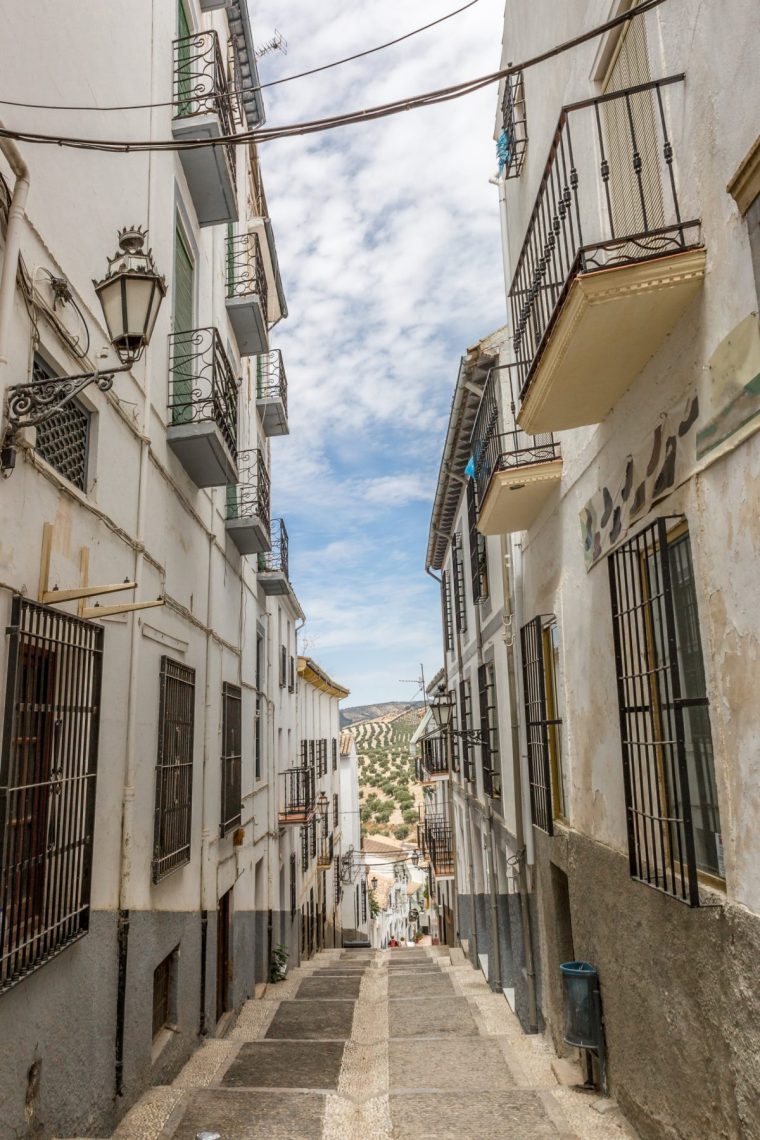 View of one street in the hilly town Montefrio, Granada, Spain