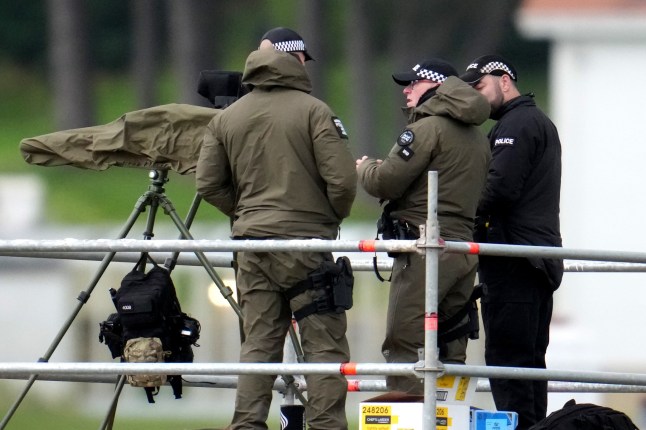 TURNBERRY, SCOTLAND - JULY 25: Police snipers are seen on the roof of the Trump Turnberry hotel ahead of U.S. President Donald Trump's visit on July 25, 2025 in Turnberry, Scotland. U.S. President Donald Trump is visiting his Trump Turnberry golf course, as well as Trump International Golf Links in Aberdeenshire, during a brief visit to Scotland from July 25 to 29. (Photo by Christopher Furlong/Getty Images)