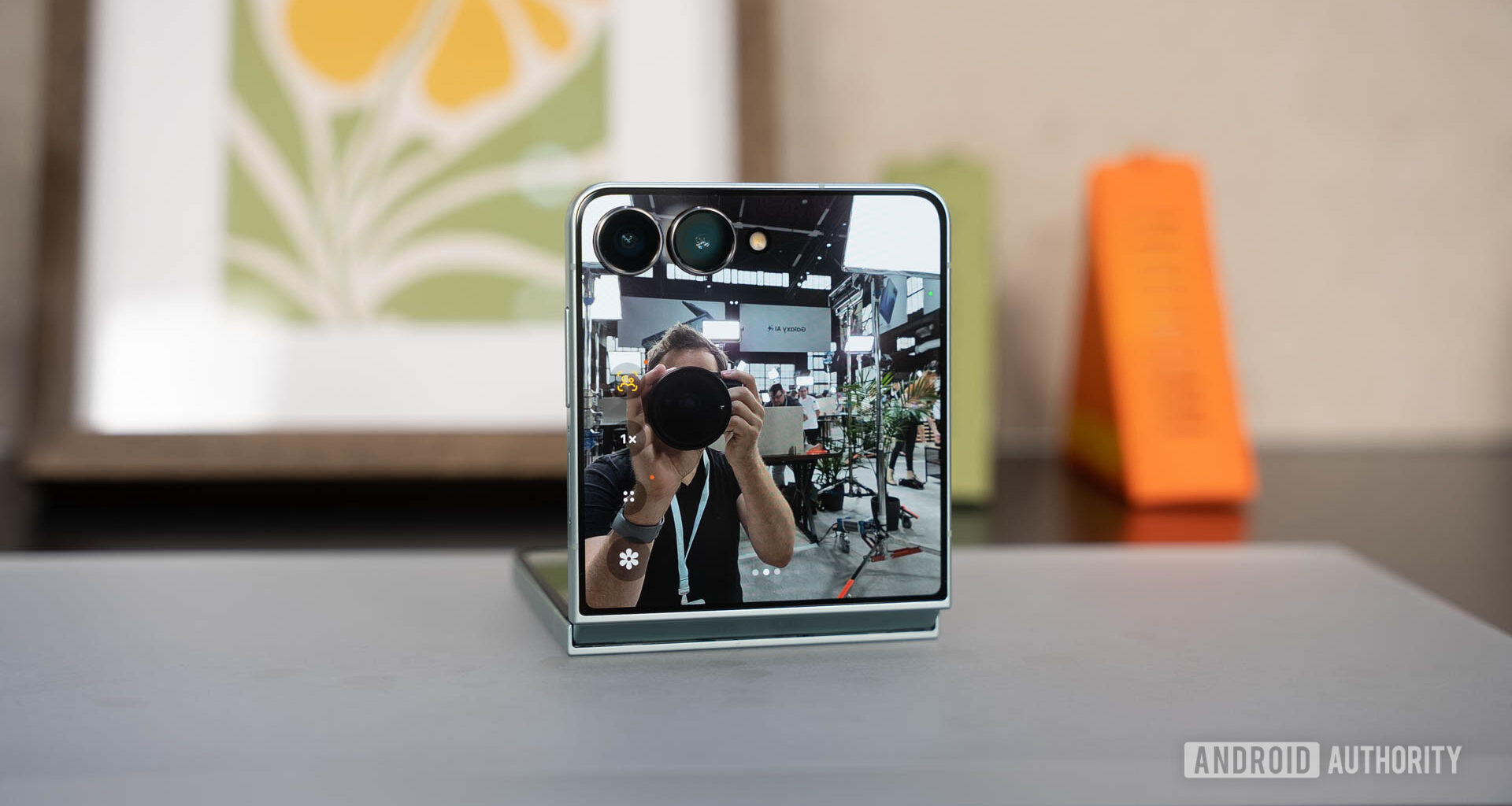 Samsung Galaxy Z Flip 7 propped on table during selfie
