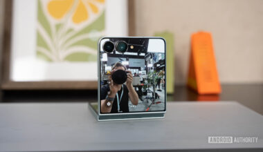 Samsung Galaxy Z Flip 7 propped on table during selfie
